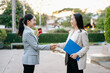 © Nuttapong punna - Asian businesswomen shaking hands to confirm partnership and business agreement, professional teamwork, trust and success concept in modern corporate environment.