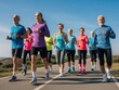 © agiepoanx - Group of runners exercising together on a clear day outdoor pathway