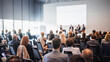 © kasto - Interview and round table discussion at business convention and presentation. Audience at the conference hall. Business and entrepreneurship symposium.