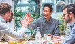 © wahid - Diverse group celebrates achievement with high five collaborative teamwork