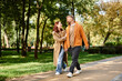 © Bliss - Spring stroll through a lush park brings joy to a loving couple