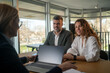 © Nenad - Family couple consultations with a lawyer or insurance agent.