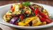 © mila103 - Colorful grilled vegetable medley with herbs on a white plate.