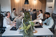 © Zoran Jesic - Diverse business people working in modern office environment