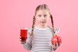© New Africa - Little girl with glass of pomegranate juice and fruit on pink background