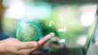 © chaylek - Sustainability manager managing global carbon footprint using digital technology and ESG industry icons. Concept of CO2 reduction, green supply chain, sustainable industry, circular economy