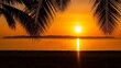 © Tazmin - Warm summer sunset on a tropical beach with palm trees