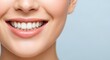 © andriebj - Close-up of a smiling woman's mouth with perfect white teeth