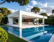 © Jangan - A modern white house with a swimming pool and lounge chairs (1)