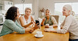 © Kobus Louw/peopleimages.com - Mature women, friends and phone at house for social media, browsing website and reading gossip. Group, people and mobile for celebrity news, review post and message notification at reunion gathering