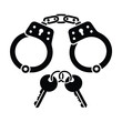 © tarek - a black and white image depicting handcuffs and keys symbolizing arrest and detainment