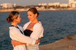 © svetograph - Mother Daughter Embrace Sunset Beach Coastline