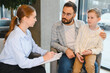 © Serhii - Father and son having a consultation with a female therapist