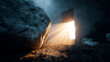 © Favio - Large stone rolled away from a dark tomb entrance with dramatic beam of warm light symbolizing resurrection hope renewal and easter faith concept.