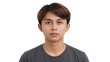 © Masaji - A calm and composed young Asian man with a neutral expression staring directly into the camera.