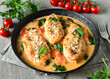 © nadin333 - Chicken breast in creamy sauce with tomatoes and spinach
