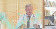 © vectorfusionart - Gesturing senior doctor in white coat at clinic desk, showing stethoscope, fan, teal-orange overlay