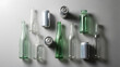 © Biyumi - Empty Glass Bottles Aluminum Cans and Jars Arranged on White Background for Recycling Waste Management and Sustainability Concept