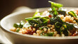 © pjjaruwan - Toasted grain bowl with wilted spinach and sun dried tomato, warm natural light, close up plant forward bowl close up vibrant grains and g be dc