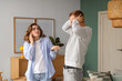 © Pixel-Shot - Young couple suffering from noisy neighbours at home