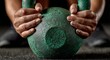 © LuDo - A woman lifts a green kettlebell, displaying strength and determination