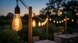 © Ahmad - Warm Glow of String Lights Illuminating an Outdoor Patio at Dusk.