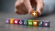 © Zahfran - Conceptual Close Up Of Wooden Cube With Healthcare Symbol Arrangement