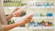 © Pavel - Woman compares and chooses hair care products in the store, carefully examining and reading option labels to make an informed purchasing decision.