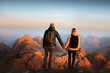 © EVERST - Couple in love enjoying views on Sinai mount top people holding hands hiking in Egypt, friends man and woman travel together on romantic vacations Valentines day adventure tour family holidays