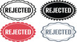 © Michael - Four distinct decorative badges display the word rejected in various shapes and colors.