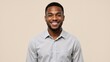 © Vasiliy - Portrait of a happy young african american man smiling. Confident black male professional looking at the camera in a studio headshot