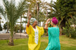 © Sabrina - Happy african mother and daughter dancing together outdoor - Family lifestyle, party and traditional dress