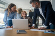 © Nenad - Laptop, collaboration and business people in the office while working on a company project. Technology, teamwork and team doing corporate research in discussion together with technology in workplace