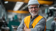 © Laura - Faceless portrait of confident factory worker smiling at camera, male industrial engineer in hard hat and safety vest in manufacturing plant, with copy space