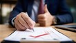 © Oleh - Businessman signing approved contract with thumb up gesture