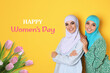 © New Africa - Happy Women's day celebration. Smiling muslim friends in hijabs and bouquet of tulips on orange background