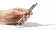 © zerostudio.id - Close Up of Hand Holding and Using a Silver Retractable Ballpoint Pen