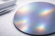 © Faisal - Silicon wafer with iridescent grid pattern for semiconductor manufacturing