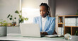 © peopleimages.com - Creative, black woman and reading with laptop in office for research, proofreading and copywriting. Person, review and pc with editor feedback, article submission and verify source for publication