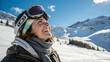 © Hanna - Smiling woman in ski gear enjoys winter day on mountain under clear blue sky with snow-covered landscape in the background