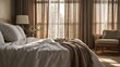 © WRONESIDED - Peaceful bedroom still life with linen sheets ceramic vase and warm morning light