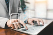 © ภัทรชัย รัตนชัยวงค์ - Businessman using laptop with digital document verification and approval checklist interface. Online workflow management, compliance control, paperless office and secure business process automation.
