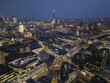 © AmazingAerialAgency - Aerial view of the city lit up with warm lights contrasting against the cool tones of the night sky, St. Paul's Cathedral and the River Thames visible, London, United Kingdom.