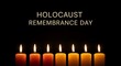 © Pixel Stone - Seven glowing memorial candles stand lit in darkness beneath bold gold text commemorating the solemn occasion of holocaust remembrance day.