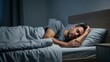 © W.O.W - Caucasian man sleeping peacefully in bed at night. Healthy sleep and relaxation concept for bedroom and home lifestyle. Good rest.