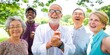 © Rawpixel.com - Group of diverse elderly people smiling outdoors. Seniors enjoying nature, laughing together. Happy elderly friends in a park, diverse and joyful gathering. Diverse elderly people outdoors.