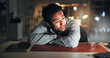 © SparkPix/peopleimages.com - Tech, tired man and wake up in office at night with editing burnout, mental fatigue and brain fog. Laptop, exhausted journalist and nap at agency with low energy, narcolepsy and overworked on article