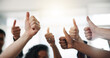 © peopleimages.com - Thumbs up, partnership and hands of business people in office for teamwork with approval for project. Collaboration, group and creative editors with gesture for agreement, solidarity or vote.