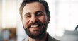 © peopleimages.com - Happy, businessman and portrait with pride in office for corporate startup or development. Man, employee or company growth with smile for career success, improvement or job opportunity in workplace