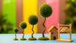 © JAHANARA - Miniature whimsical scene with tiny trees and house